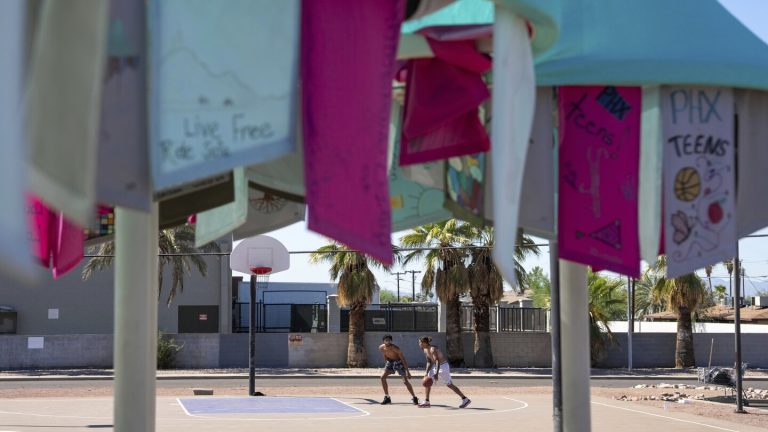 US cities use art, shade and education to beat the heat
